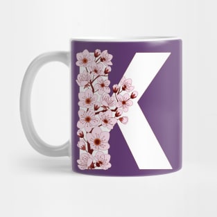 Colorful capital letter K patterned with sakura twig Mug